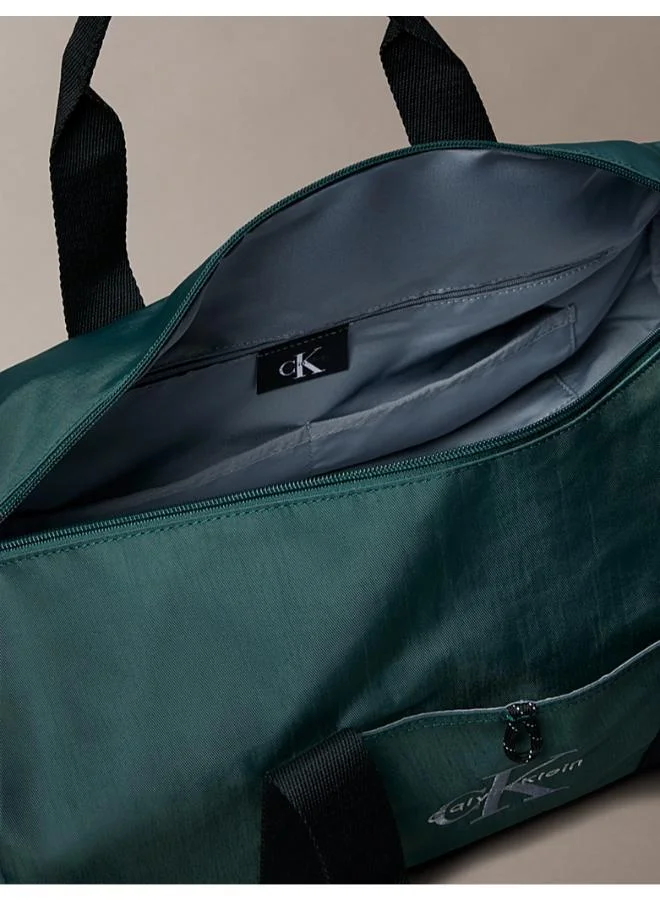 CALVIN KLEIN Dark Teal Bold Logo Nylon Duffle Bag for Men | Best Price UAE